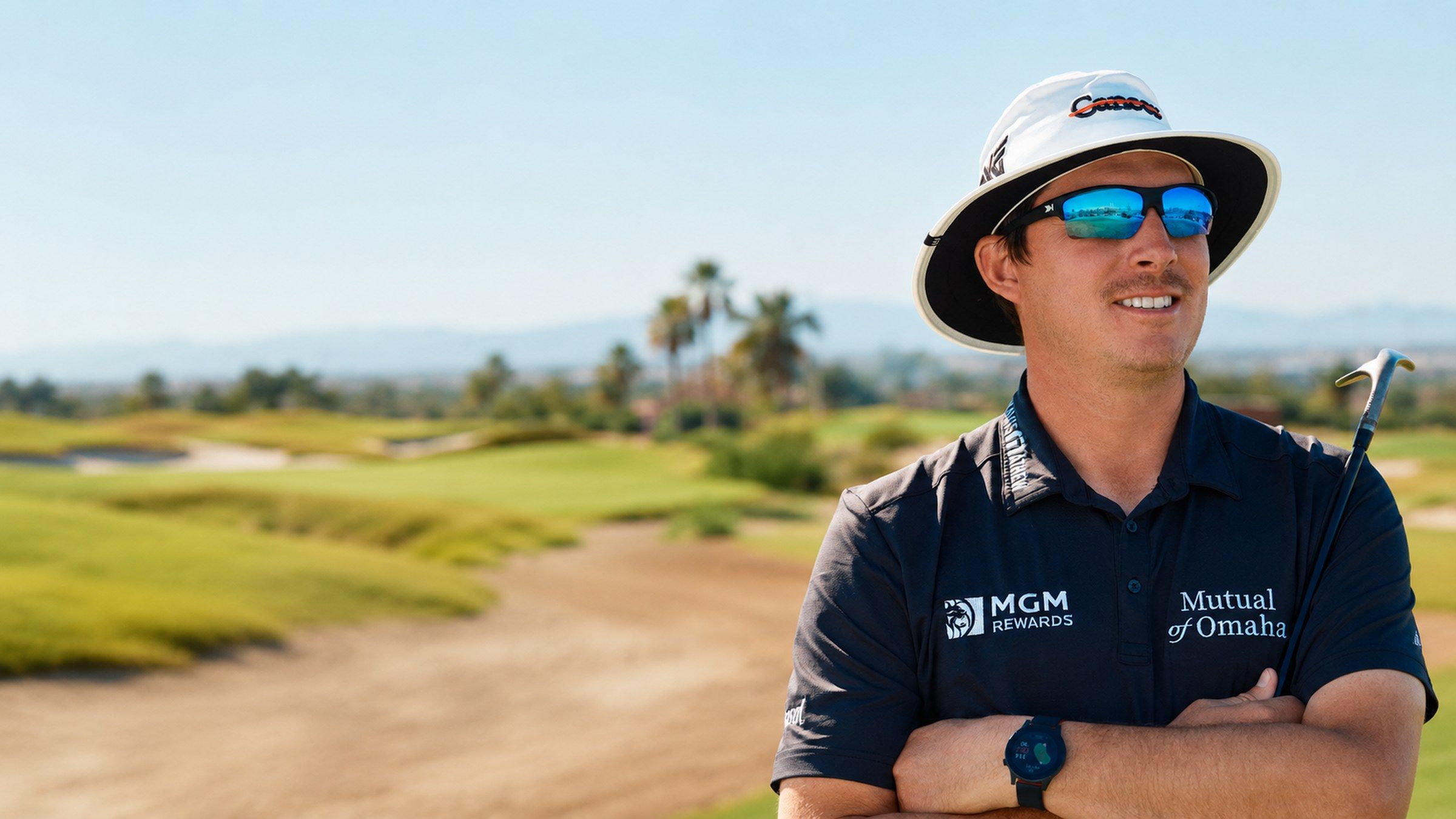 Joel Dahmen on the course, wearing a Rad Watch+ on his wrist.
